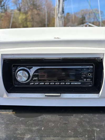 Lucky Dog Too Yacht Photos Pics JVC stereo system on a 2008 Hunter 41 DS sailboat dashboard.