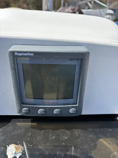 Lucky Dog Too Yacht Photos Pics Raymarine depth gauge on 2008 Hunter 41 DS sailboat, displaying depth measurement controls.