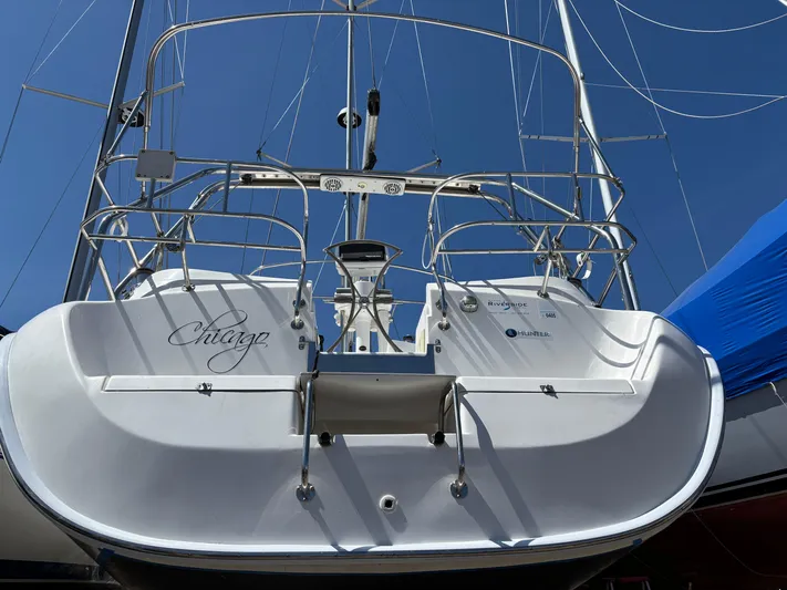 Lucky Dog Too Yacht Photos Pics Sailboat Hunter 41 DS 2008, rear view, docked under clear blue sky.