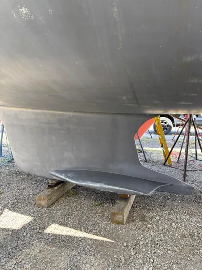 Lucky Dog Too Yacht Photos Pics 2008 Hunter 41 DS sailboat keel on dry dock, supported by wooden blocks.