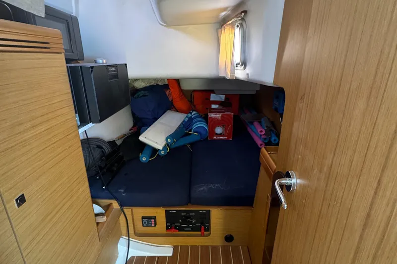 Pelican Pat Yacht Photos Pics Interior cabin of 2010 Jeanneau Sun Odyssey 42i sailboat, featuring storage and equipment.
