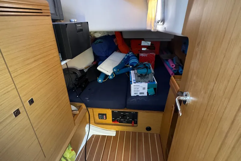 Pelican Pat Yacht Photos Pics Interior cabin of 2010 Jeanneau Sun Odyssey 42i yacht with storage and equipment.