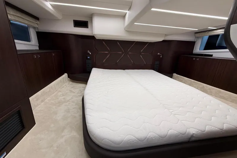  Yacht Photos Pics Luxurious interior cabin of 2024 Galeon 410 HTC yacht with modern design.