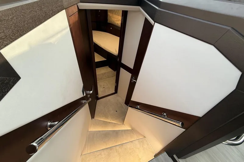  Yacht Photos Pics Staircase leading to cabin interior of 2024 Galeon 410 HTC yacht.