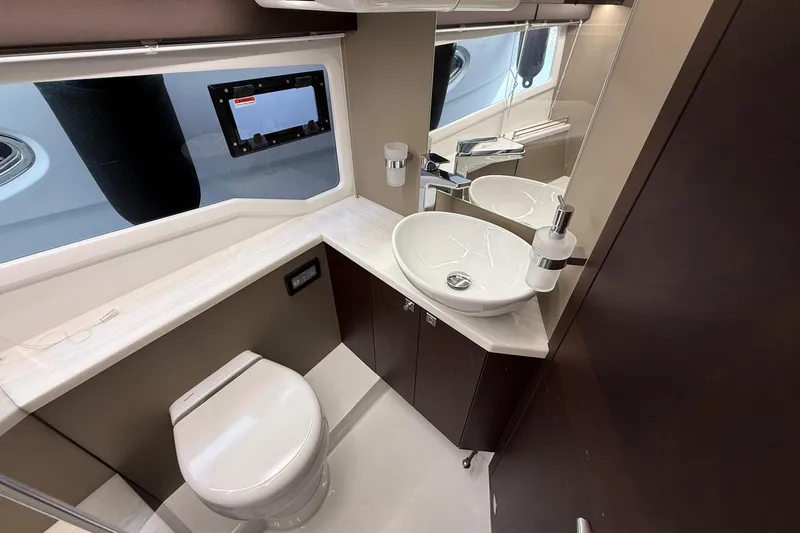  Yacht Photos Pics Luxurious bathroom interior of 2024 Galeon 410 HTC yacht, featuring modern fixtures and elegant design.