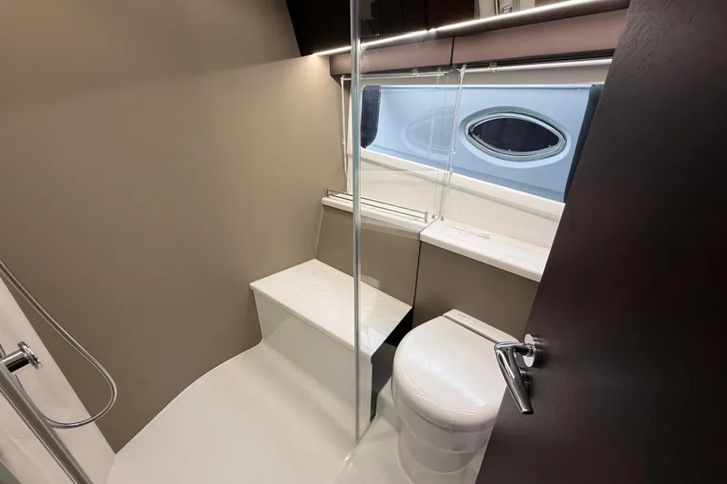  Yacht Photos Pics Luxurious bathroom interior of 2024 Galeon 410 HTC yacht with modern fixtures.