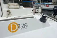 Sailboat Maree Haute DJANGO 770, 2011 model, docked at marina with visible winch.