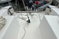 Sailboat cockpit of 2011 Maree Haute DJANGO 770 with ropes and motor.