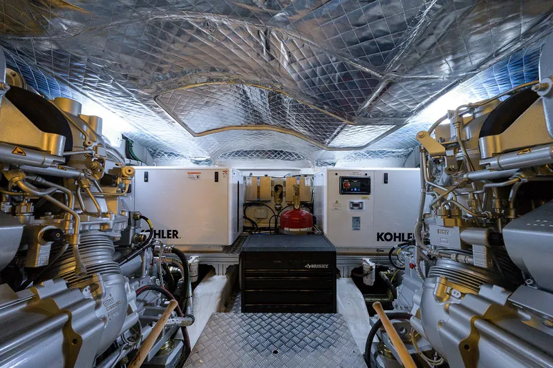 Shine Yacht Photos Pics Engine room of 2022 Pershing 9X yacht with Kohler generators and advanced machinery.