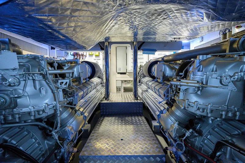 Shine Yacht Photos Pics Engine room of 2022 Pershing 9X yacht, showcasing advanced machinery and equipment.