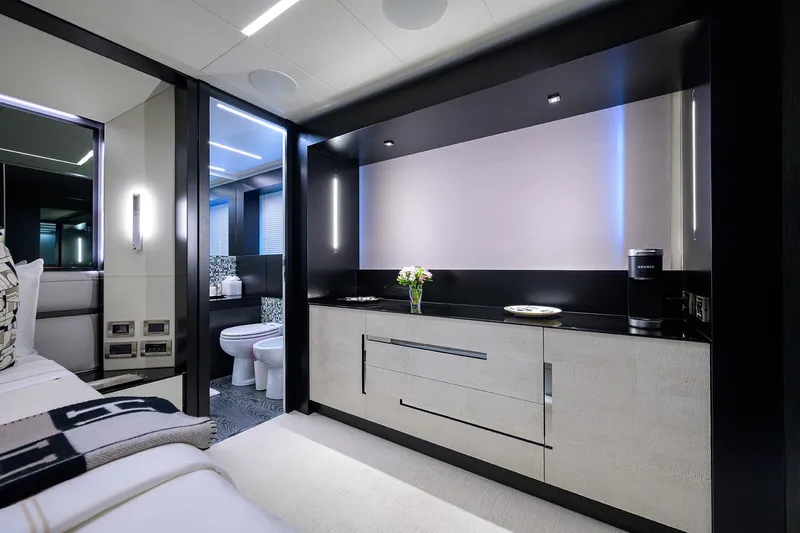 Shine Yacht Photos Pics Luxurious interior of 2022 Pershing 9X yacht featuring modern design and amenities.