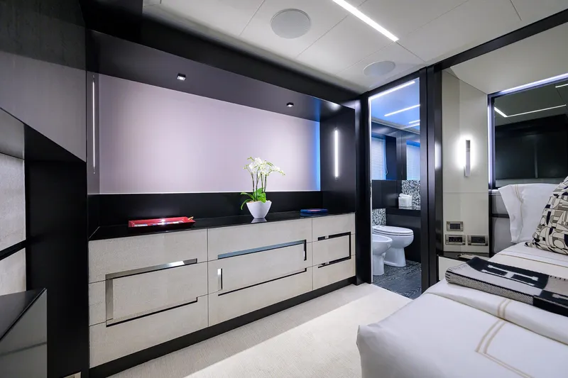 Shine Yacht Photos Pics Luxurious interior of 2022 Pershing 9X yacht with modern bedroom and bathroom design.