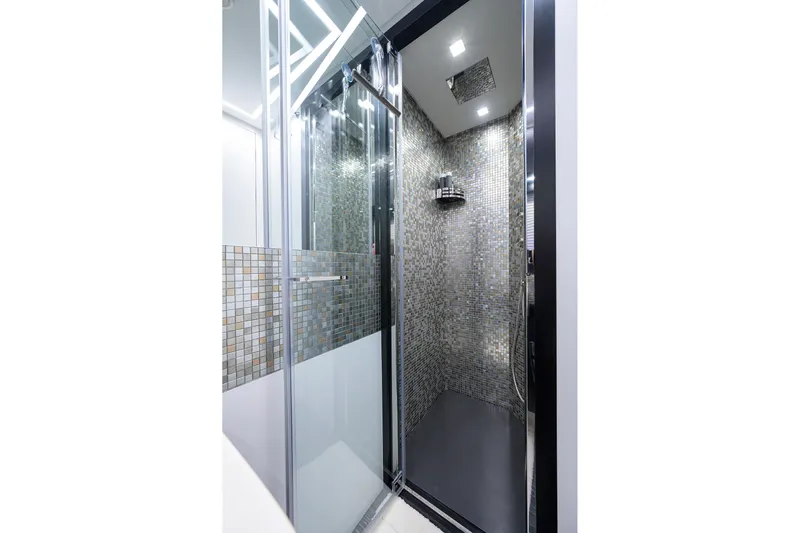 Shine Yacht Photos Pics Luxurious shower with mosaic tiles in 2022 Pershing 9X yacht.