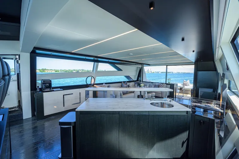 Shine Yacht Photos Pics Luxurious interior of 2022 Pershing 9X yacht with modern design and ocean view.