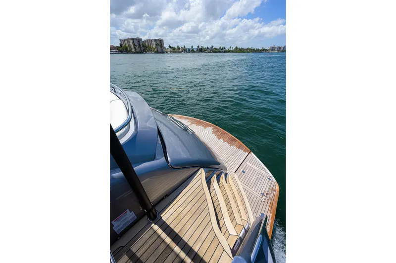 Shine Yacht Photos Pics Luxury Pershing 9X yacht deck, 2022 model, cruising on a sunny day.