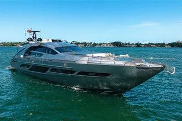Shine Yacht Photos Pics 2022 Pershing 9X luxury yacht cruising on clear blue waters.