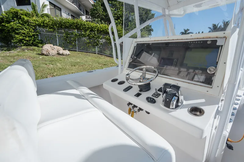  Yacht Photos Pics 2009 SeaHunter 40 boat cockpit with steering wheel and control panel.