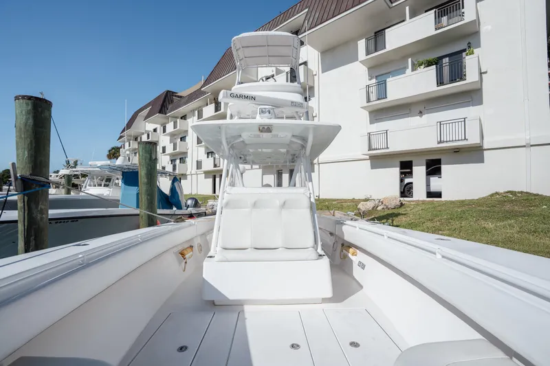  Yacht Photos Pics 2009 SeaHunter 40 boat docked near waterfront building, featuring Garmin equipment.