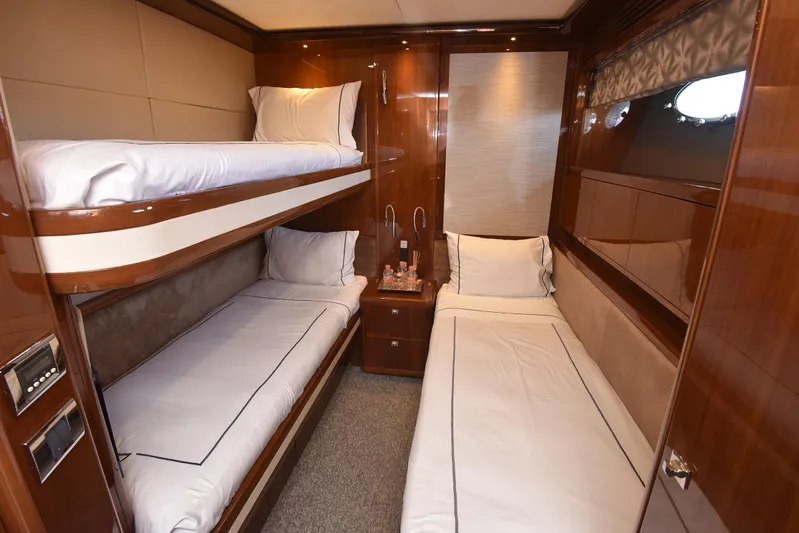 Princess One Yacht Photos Pics Luxurious cabin with bunk beds in 2014 Princess Flybridge 98Y Motor Yacht.
