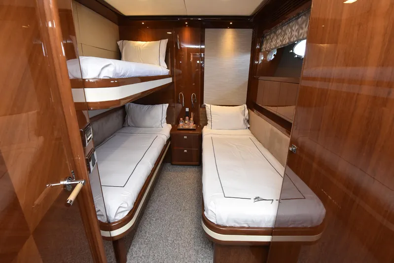 Princess One Yacht Photos Pics Luxurious cabin interior of 2014 Princess Flybridge 98Y Motor Yacht with wooden finishes.