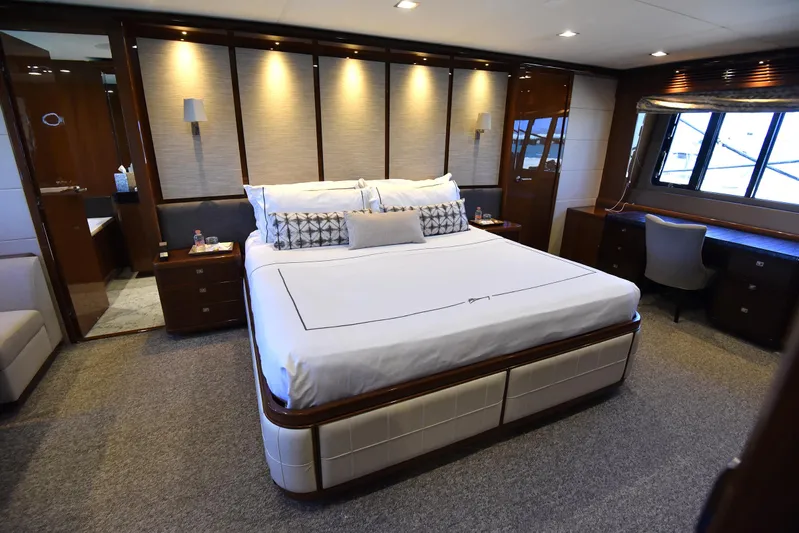 Princess One Yacht Photos Pics Luxurious bedroom interior of 2014 Princess Flybridge 98Y Motor Yacht.