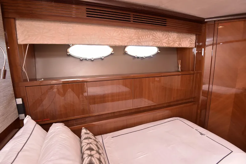 Princess One Yacht Photos Pics Luxurious cabin interior of 2014 Princess Flybridge 98Y Motor Yacht with elegant wood finish.