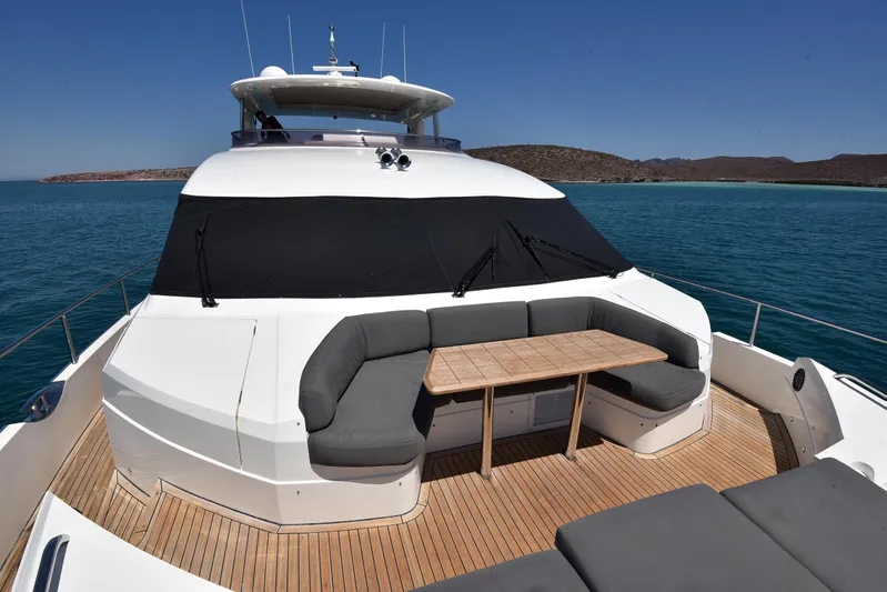 Princess One Yacht Photos Pics Luxurious 2014 Princess Flybridge 98Y Motor Yacht with spacious deck seating and scenic ocean view.