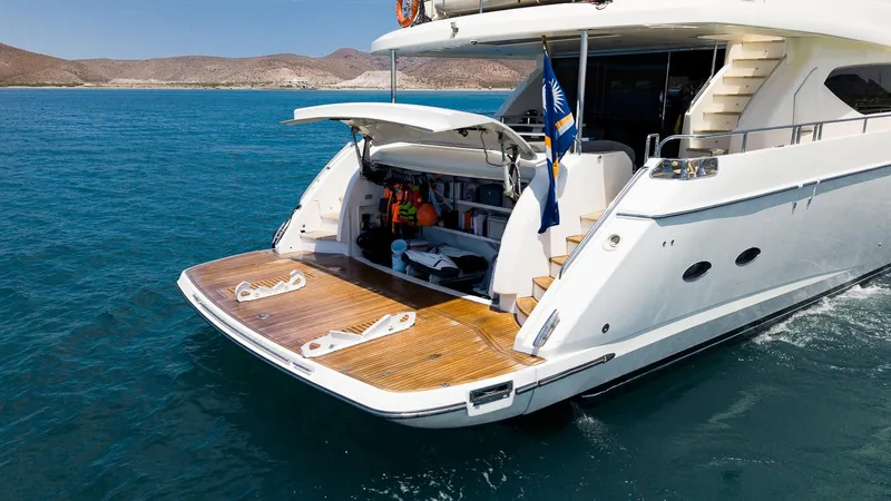 Princess One Yacht Photos Pics Luxurious 2014 Princess Flybridge 98Y Motor Yacht on serene blue waters.