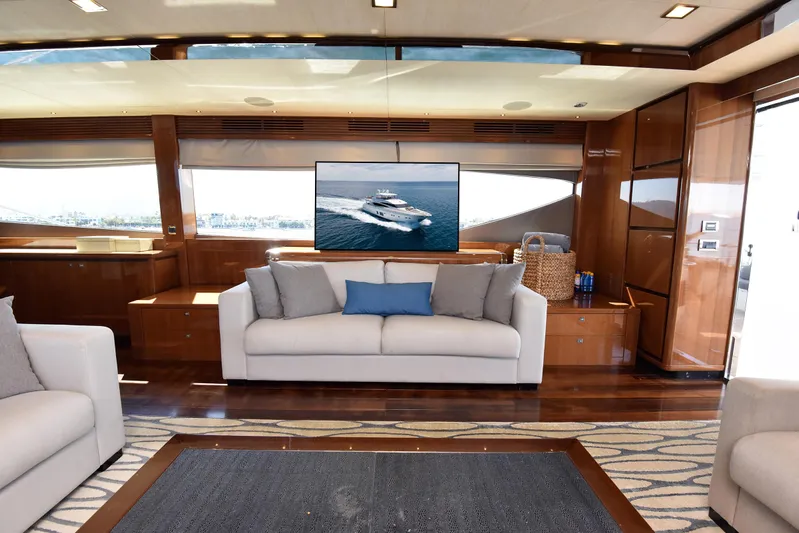 Princess One Yacht Photos Pics Luxurious interior of 2014 Princess Flybridge 98Y Motor Yacht with elegant seating and modern decor.