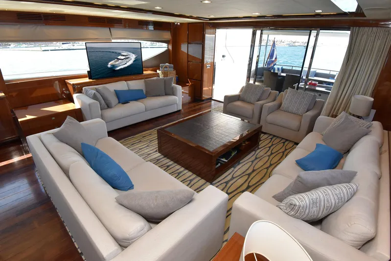 Princess One Yacht Photos Pics Luxurious interior of 2014 Princess Flybridge 98Y Motor Yacht with elegant seating and ocean view.