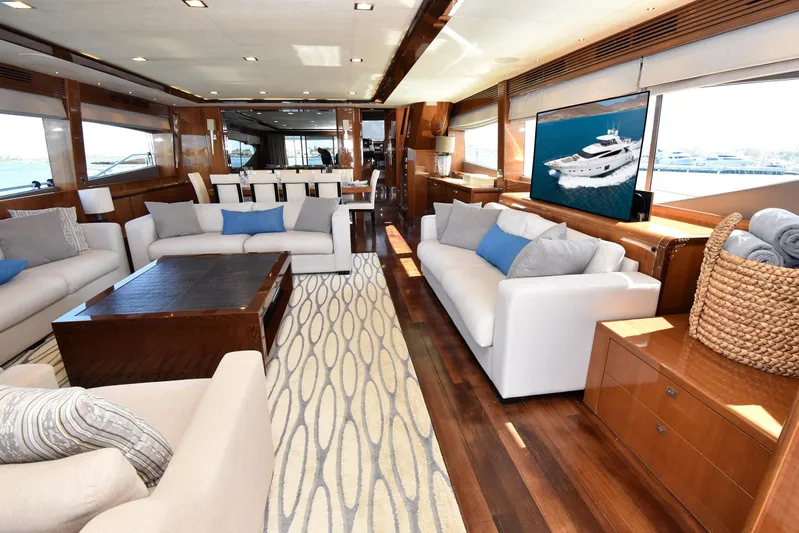 Princess One Yacht Photos Pics Luxurious interior of 2014 Princess Flybridge 98Y Motor Yacht with elegant seating and decor.