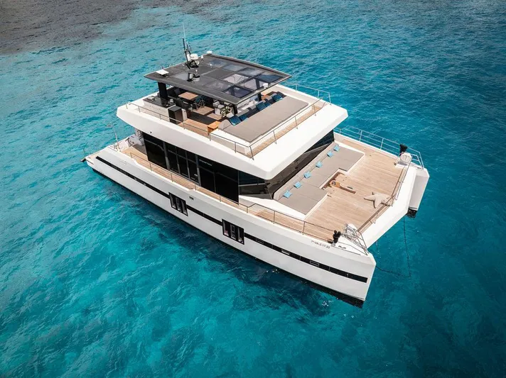 Rosa Del Mar Yacht Photos Pics Luxury Sunreef Supreme 68 yacht from 2017 on clear blue water.