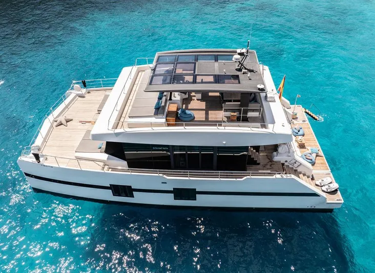 Rosa Del Mar Yacht Photos Pics Luxurious 2017 Sunreef Supreme 68 yacht on clear blue water.