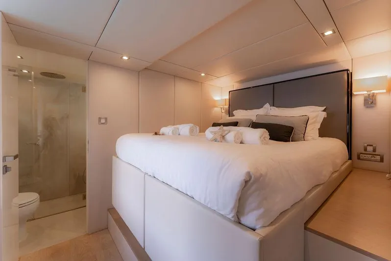 Rosa Del Mar Yacht Photos Pics Luxurious bedroom on 2017 Sunreef Supreme 68 yacht with ensuite bathroom.