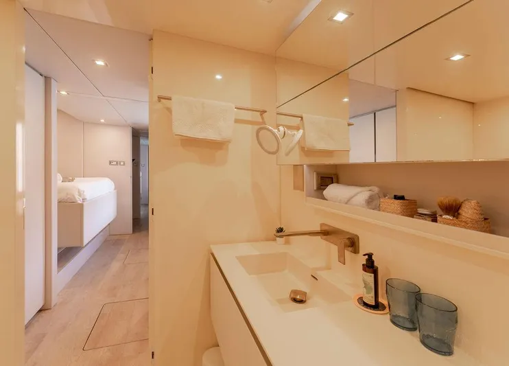 Rosa Del Mar Yacht Photos Pics Luxurious bathroom interior of 2017 Sunreef Supreme 68 yacht, featuring modern fixtures and elegant design.