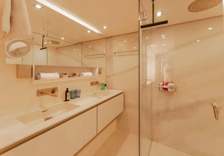 Rosa Del Mar Yacht Photos Pics Luxurious bathroom in 2017 Sunreef Supreme 68 yacht with modern fixtures and glass shower.