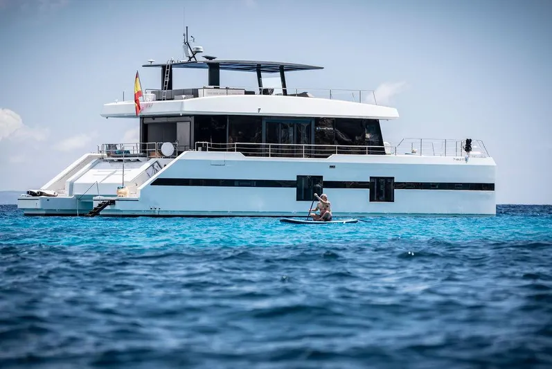 Rosa Del Mar Yacht Photos Pics Luxury Sunreef Supreme 68 yacht on clear blue water, 2017 model.