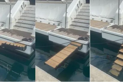 Rosa Del Mar Yacht Photos Pics Sunreef Supreme 68 yacht, 2017 model, with a retractable wooden gangway.