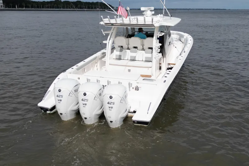  Yacht Photos Pics 2020 Pursuit S 408 Sport boat with triple Yamaha 425 V8 engines on water.