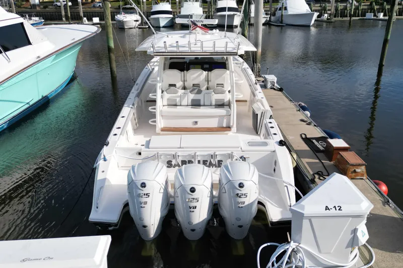  Yacht Photos Pics 2020 Pursuit S 408 Sport boat docked with triple Yamaha 425 engines.