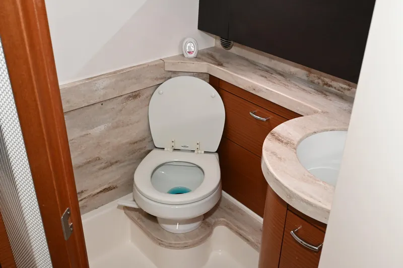  Yacht Photos Pics Luxurious bathroom in 2020 Pursuit S 408 Sport boat with modern fixtures.