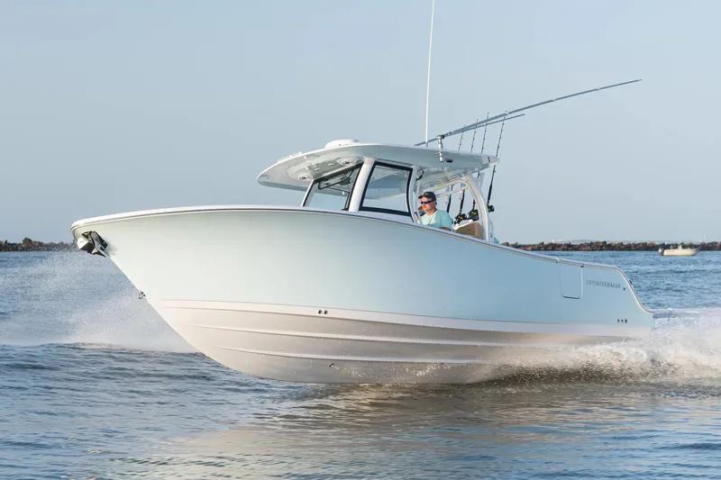  Yacht Photos Pics Manufacturer Provided Image: 2024 Sportsman Open 302 Center Console boat cruising on water.