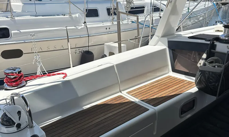 Lele Kalua Yacht Photos Pics 2014 Beneteau Oceanis 41 yacht deck with wooden seating and winch.