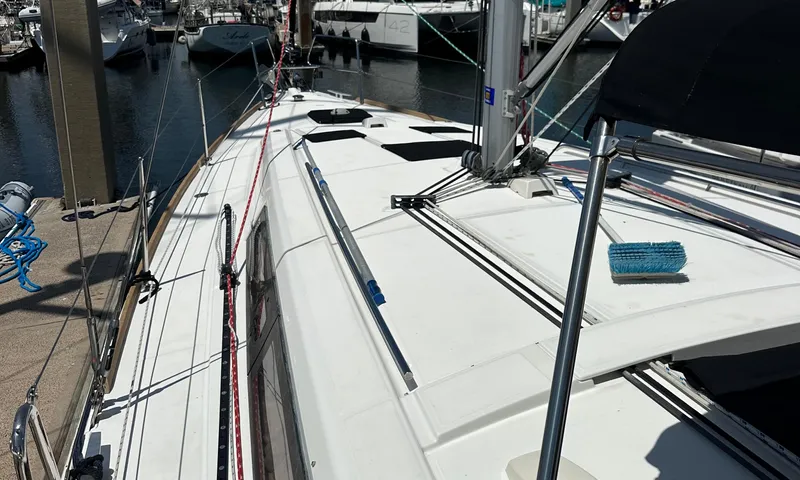 Lele Kalua Yacht Photos Pics 2014 Beneteau Oceanis 41 sailboat docked at marina, showing deck and rigging.