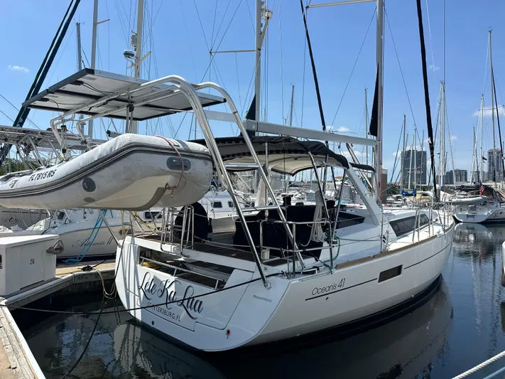 Lele Kalua Yacht Photos Pics 2014 Beneteau Oceanis 41 sailboat docked at marina with dinghy on davits.