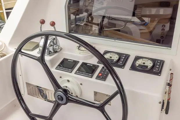 Honu Kai Yacht Photos Pics Steering wheel and control panel of 2019 Seawind 1260 catamaran.