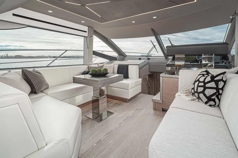  Yacht Photos Pics Luxurious interior of 2021 Sunseeker Manhattan 55 yacht with elegant seating and modern design.