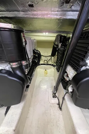 Esquire Yacht Photos Pics Engine room of 2017 Riviera 3600 Sport Yacht, showcasing dual engines and mechanical components.