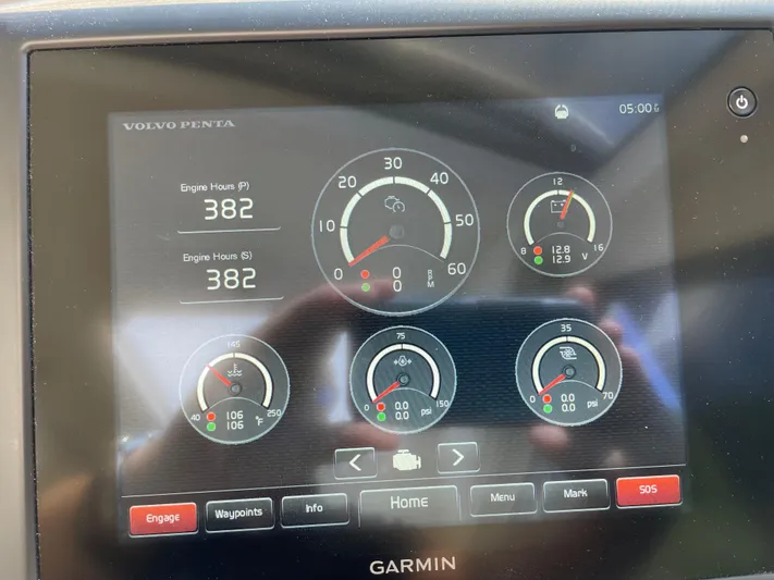 Esquire Yacht Photos Pics Dashboard display of a 2017 Riviera 3600 Sport Yacht showing engine hours and gauges.