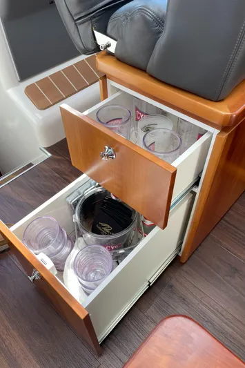 Esquire Yacht Photos Pics Open drawers with cups inside a 2017 Riviera 3600 Sport Yacht interior.